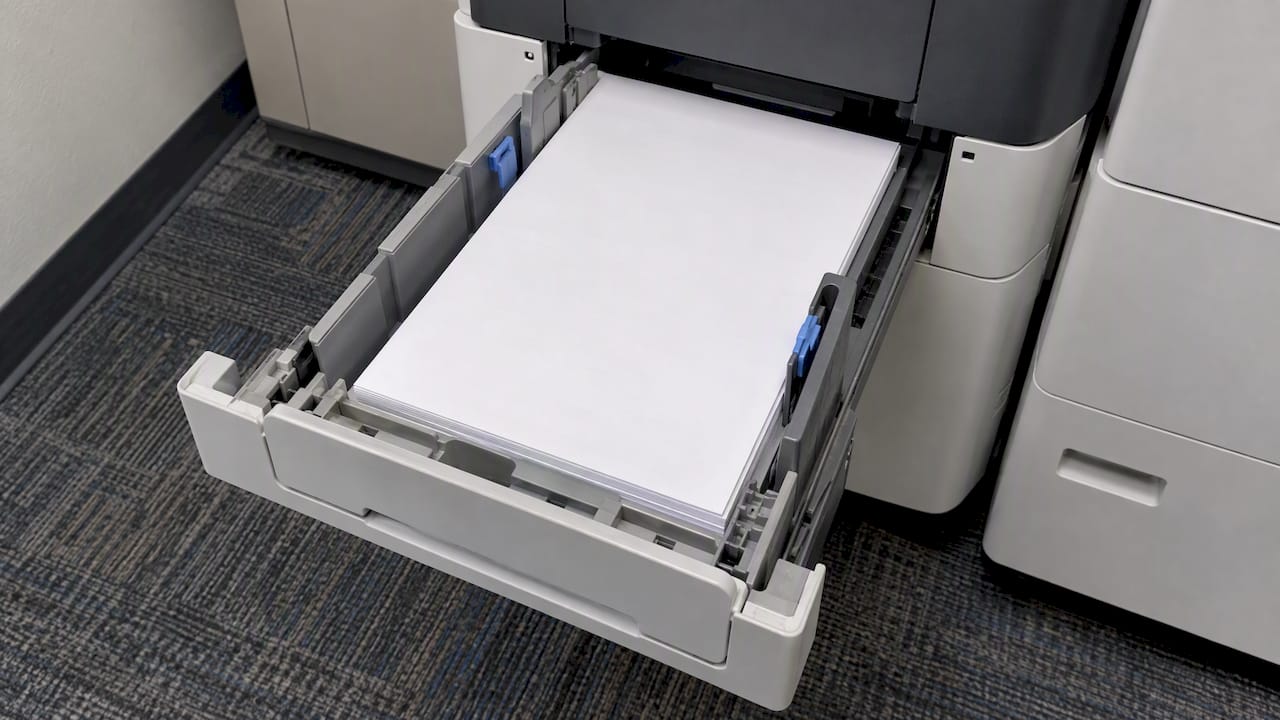 Legal-size paper aligned in printer tray